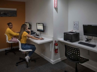 study room with computers and a printer