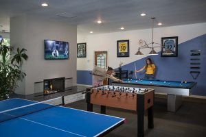 game room with billiards, foosball and ping pong