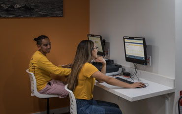 study room with computers and a printer